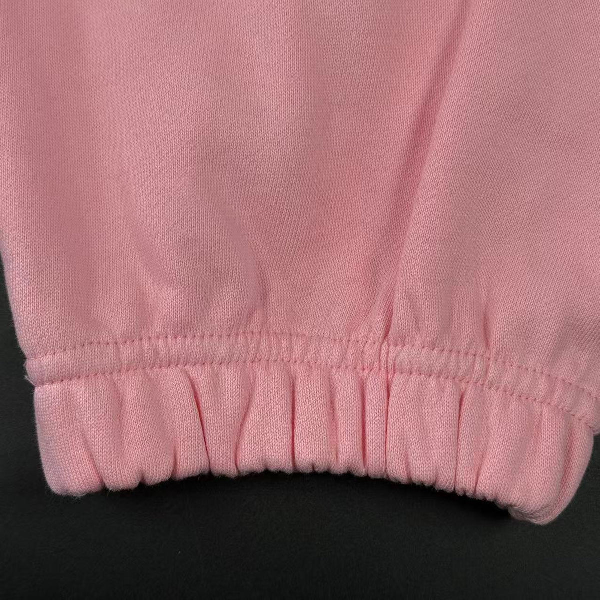 DENIM TEARS – Pantaloni rosa