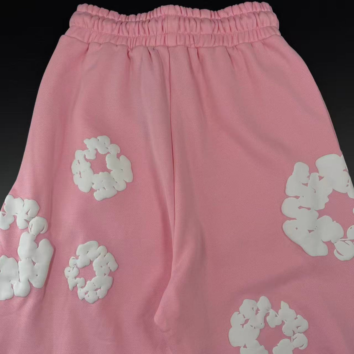 DENIM TEARS – Pantaloni rosa