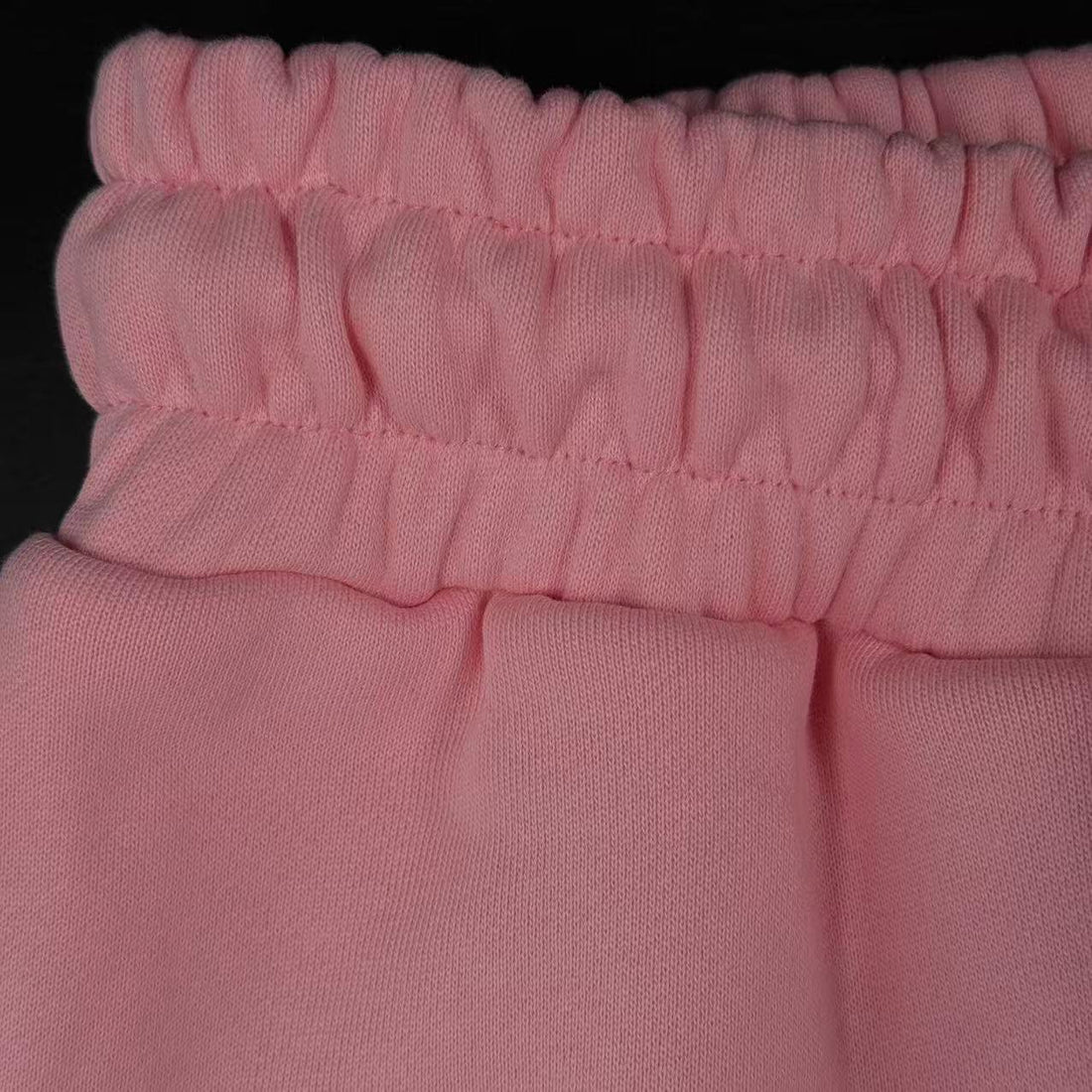 DENIM TEARS – Pantaloni rosa