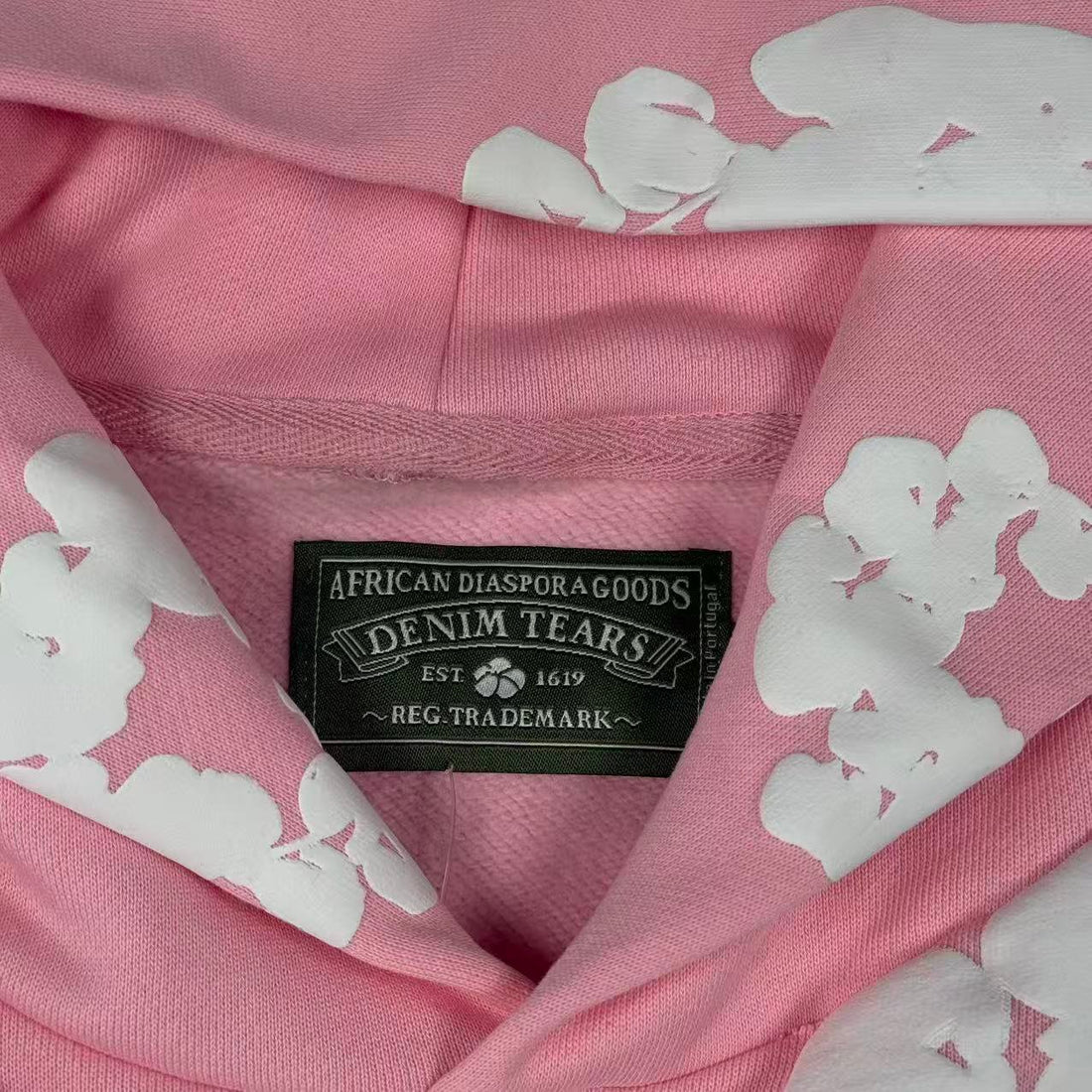 DENIM TEARS – Felpa con cappuccio rosa