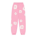 DENIM TEARS – Pantaloni rosa