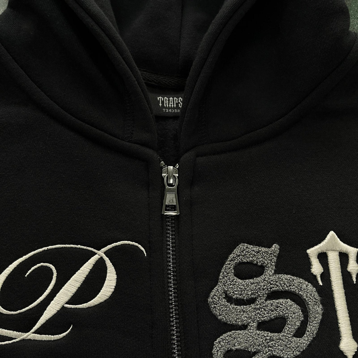 TUTA CON ZIP SCRIP